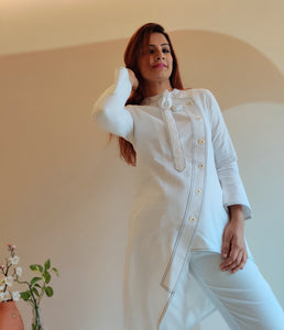 WHITE ASYMMETRIC LONG JACKET PAIRED WITH FITTED PANTS