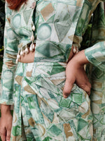 Load image into Gallery viewer, GREEN ABSTRACT PRINTED SHELLED SKIRT SAREE WITH ATTACHED FRONT PALLU AND SHIRT BLOUSE
