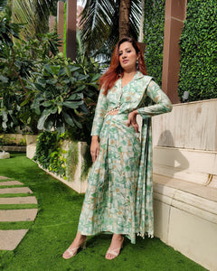 GREEN ABSTRACT PRINTED SHELLED SKIRT SAREE WITH ATTACHED FRONT PALLU AND SHIRT BLOUSE