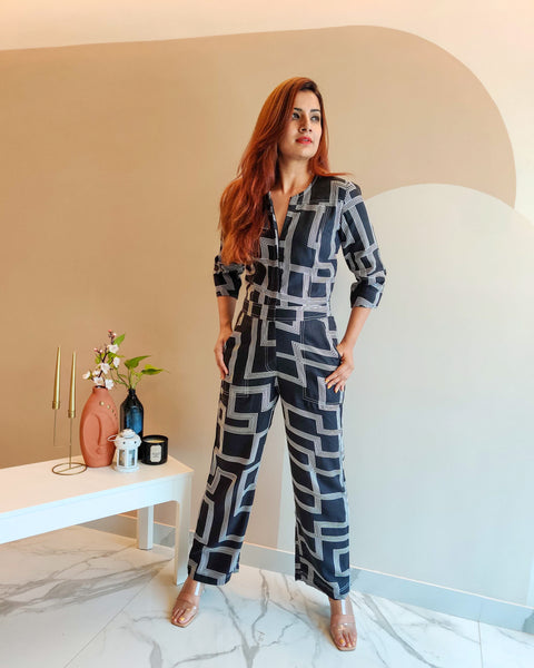 BLACK GEOMETRIC PRINT FRONT ZIP JUMPSUIT