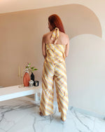 Load image into Gallery viewer, YELLOW PRINTED STRIPES HALTER NECK FLARED JUMPSUIT
