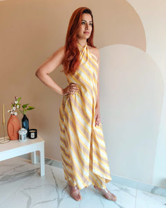 YELLOW PRINTED STRIPES HALTER NECK FLARED JUMPSUIT