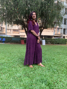 PURPLE WAVE PRINT JUMPSUIT WITH SLEEVED JACKET