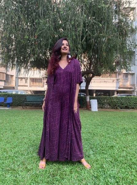 PURPLE WAVE PRINT JUMPSUIT WITH SLEEVED JACKET