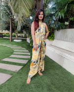 Load image into Gallery viewer, YELLOW BLUE ABSTRACT HALTER NECK FLARED DRAPE JUMPSUIT
