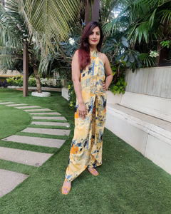YELLOW BLUE ABSTRACT HALTER NECK FLARED DRAPE JUMPSUIT