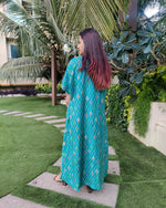 Load image into Gallery viewer, GREEN GEOMETRIC PRINT LONG JACKET WITH NOODLE STRAP BUSTIER AND DHOTI PANTS
