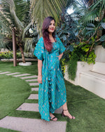 Load image into Gallery viewer, GREEN GEOMETRIC PRINT LONG JACKET WITH NOODLE STRAP BUSTIER AND DHOTI PANTS
