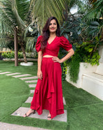 Load image into Gallery viewer, RED PUFFED SLEEVES TOP WITH TIE UP DETAIL PAIRED WITH FLARED PANTS
