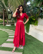 Load image into Gallery viewer, RED PUFFED SLEEVES TOP WITH TIE UP DETAIL PAIRED WITH FLARED PANTS
