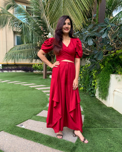 RED PUFFED SLEEVES TOP WITH TIE UP DETAIL PAIRED WITH FLARED PANTS