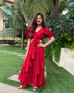 Load image into Gallery viewer, RED PUFFED SLEEVES TOP WITH TIE UP DETAIL PAIRED WITH FLARED PANTS
