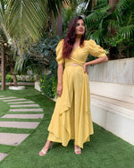 Load image into Gallery viewer, LIME YELLOW PUFFED SLEEVES TOP WITH TIE UP DETAIL PAIRED WITH FLARED PANTS
