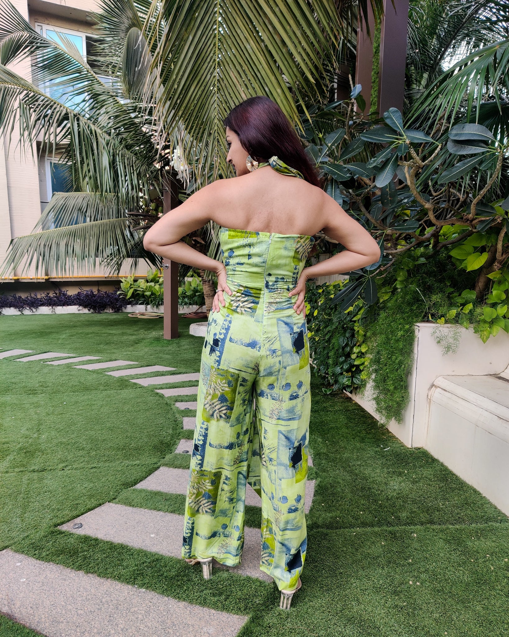 GREEN ABSTRACT HALTER NECK FLARED DRAPE JUMPSUIT