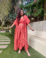 Load image into Gallery viewer, ORANGE GEOMETRIC PRINT LONG JACKET WITH NOODLE STRAP BUSTIER AND DHOTI PANTS
