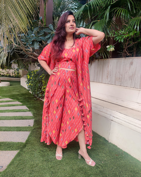 ORANGE GEOMETRIC PRINT LONG JACKET WITH NOODLE STRAP BUSTIER AND DHOTI PANTS