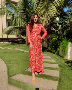 RED ZIG-ZAG PRINTED SHELLED SKIRT SAREE WITH ATTACHED FRONT PALLU AND SHIRT BLOUSE