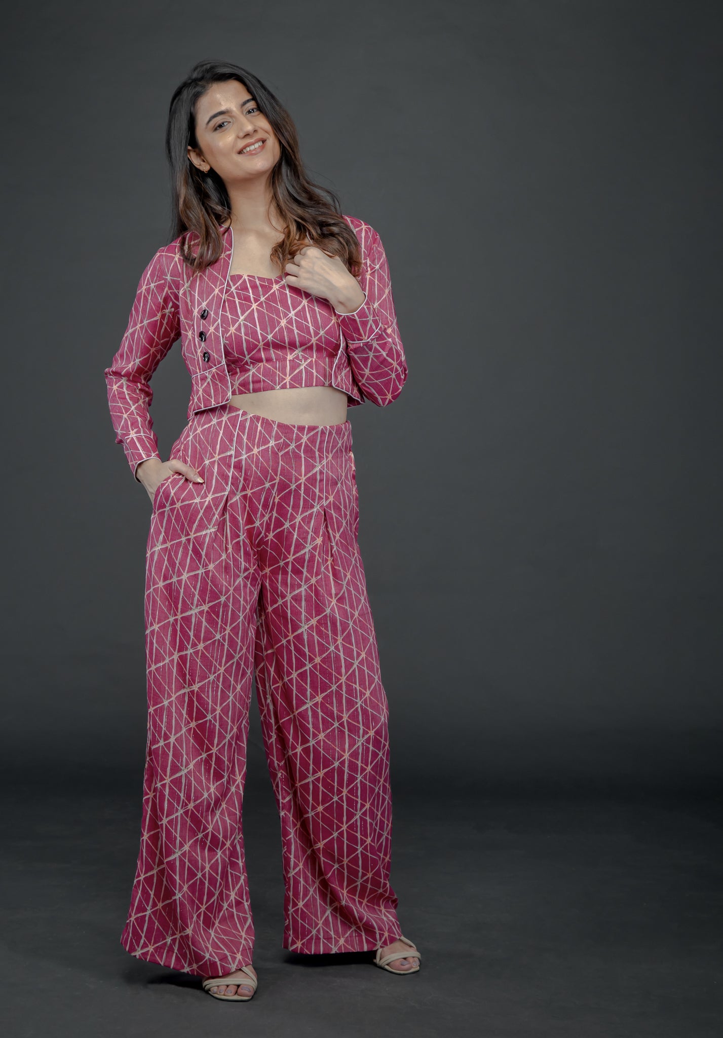 PINK LUREX GEO PRINT SHORT JACKET PAIRED TUBE BUSTIER AND FLARE PANTS