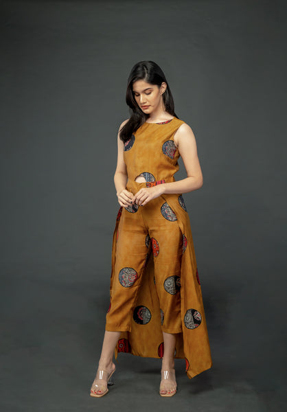 MUSTARD PRINTED SLEEVELESS JUMPSUIT WITH CAPE
