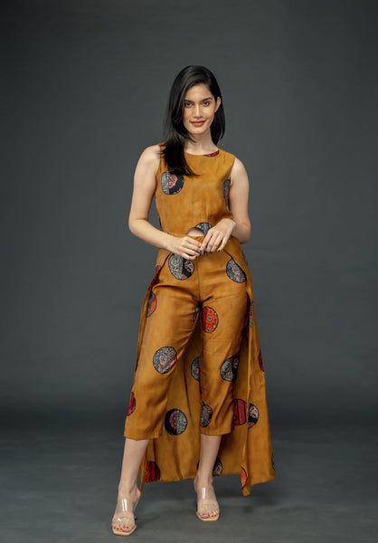 MUSTARD PRINTED SLEEVELESS JUMPSUIT WITH CAPE