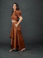 Load image into Gallery viewer, CHOCOLATE BROWN PUFFED SLEEVES TOP WITH TIE UP DETAIL PAIRED WITH FLARED PANTS
