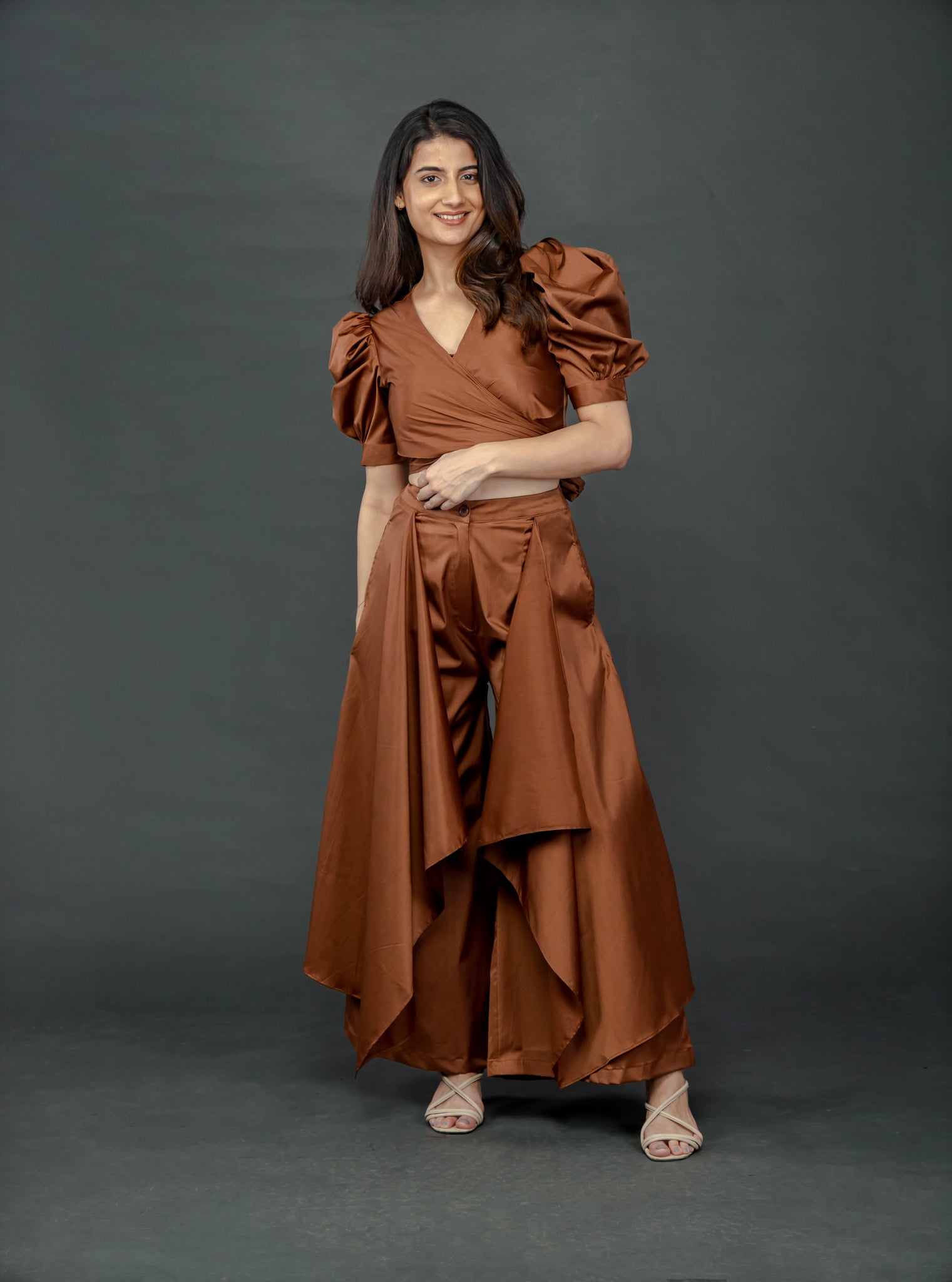 CHOCOLATE BROWN PUFFED SLEEVES TOP WITH TIE UP DETAIL PAIRED WITH FLARED PANTS