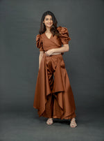 Load image into Gallery viewer, CHOCOLATE BROWN PUFFED SLEEVES TOP WITH TIE UP DETAIL PAIRED WITH FLARED PANTS
