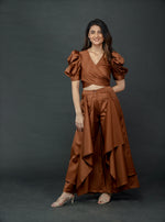Load image into Gallery viewer, CHOCOLATE BROWN PUFFED SLEEVES TOP WITH TIE UP DETAIL PAIRED WITH FLARED PANTS

