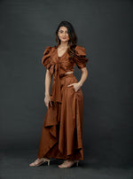 Load image into Gallery viewer, CHOCOLATE BROWN PUFFED SLEEVES TOP WITH TIE UP DETAIL PAIRED WITH FLARED PANTS
