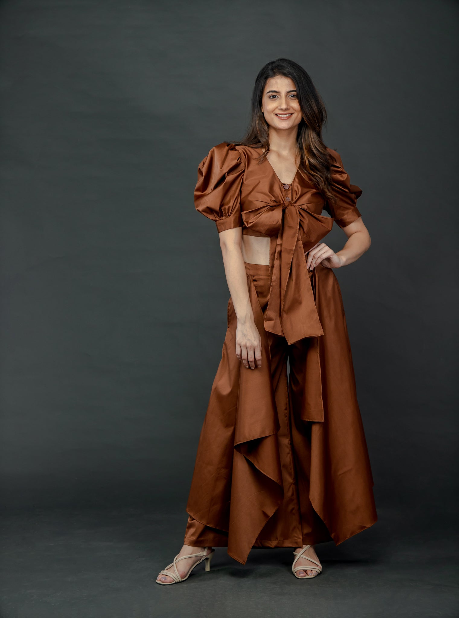 CHOCOLATE BROWN PUFFED SLEEVES TOP WITH TIE UP DETAIL PAIRED WITH FLARED PANTS