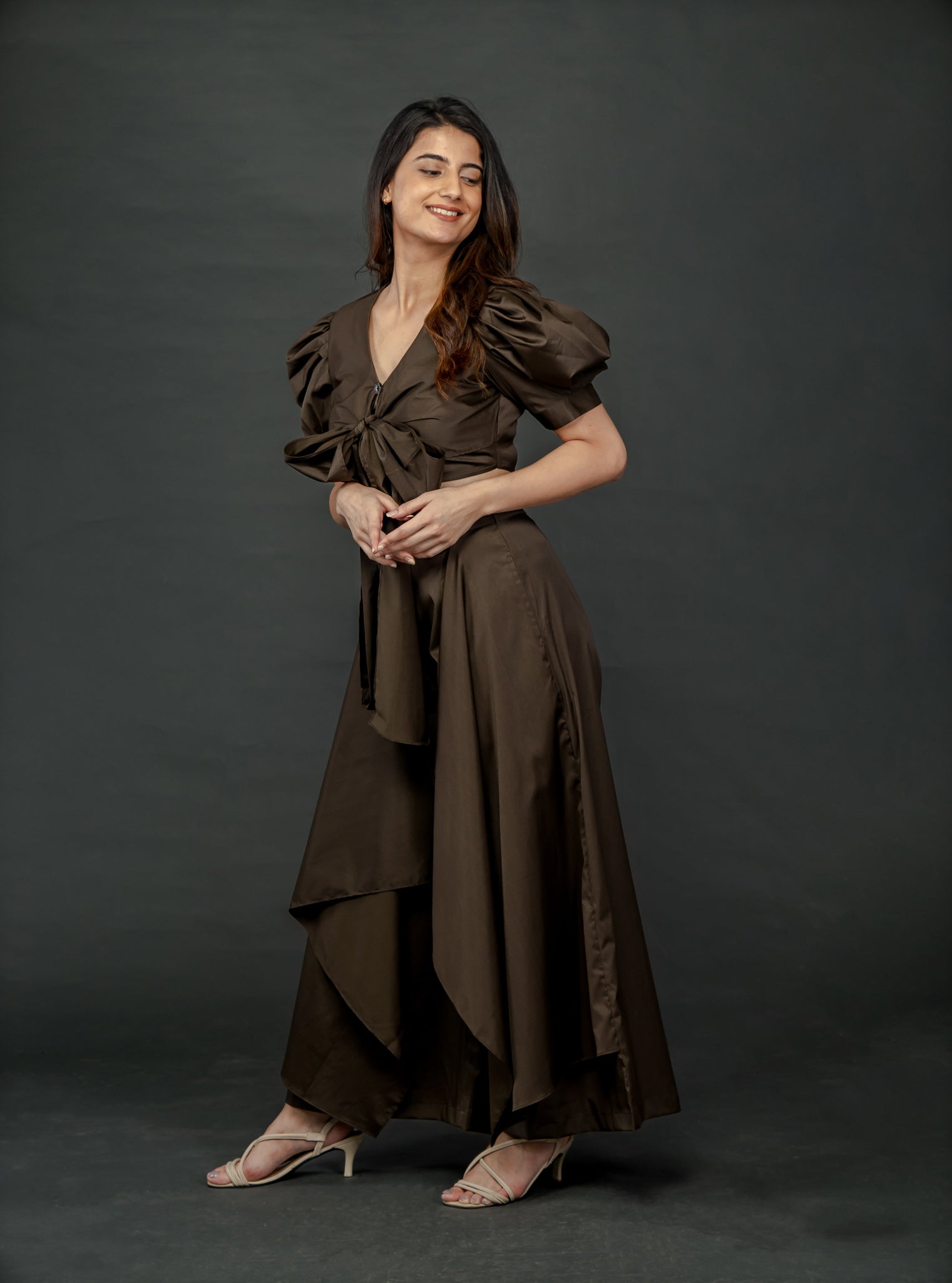 OLIVE GREEN PUFFED SLEEVES TOP WITH TIE UP DETAIL PAIRED WITH FLARED PANTS