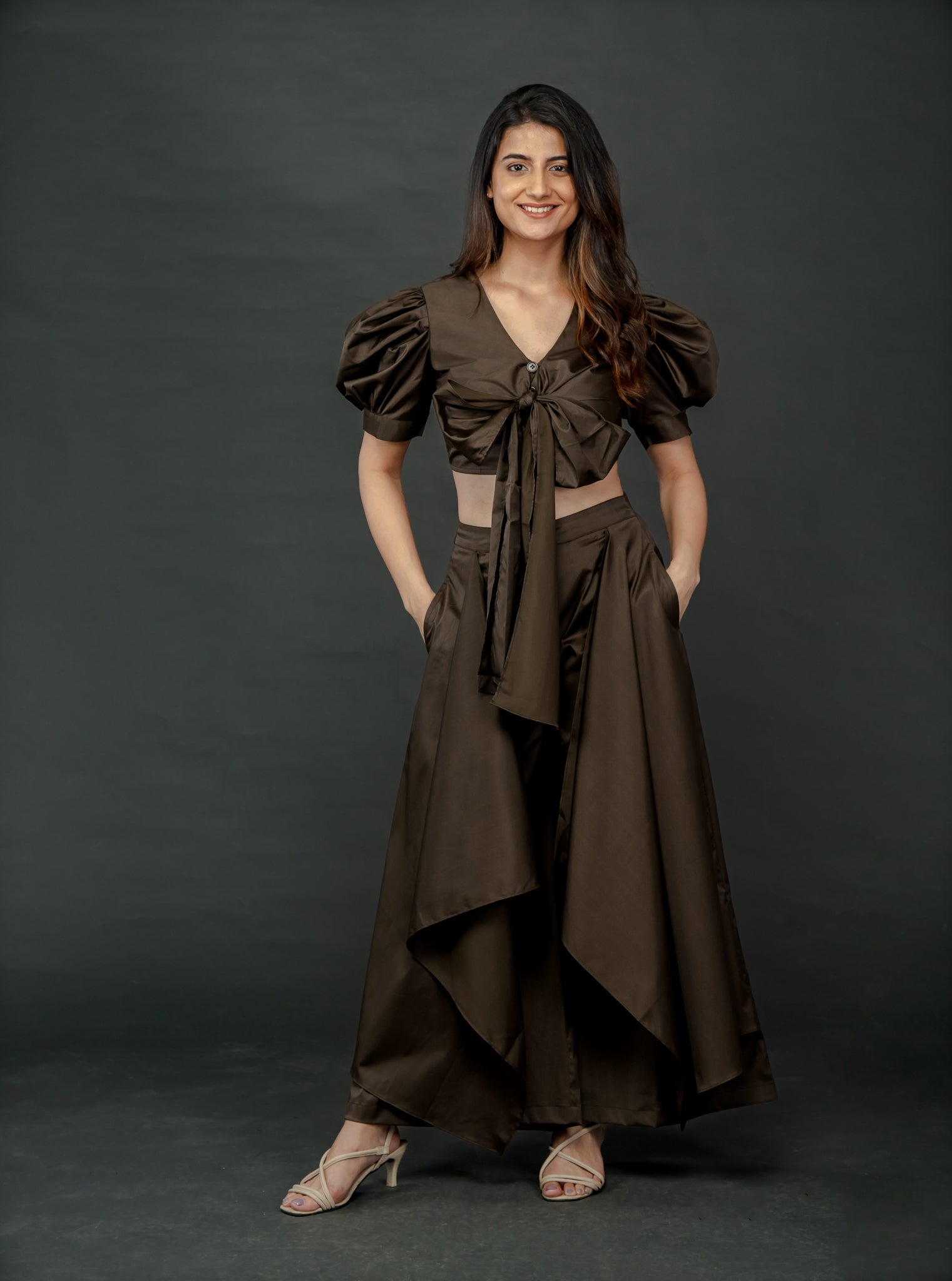 OLIVE GREEN PUFFED SLEEVES TOP WITH TIE UP DETAIL PAIRED WITH FLARED PANTS