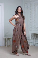 Load image into Gallery viewer, BROWN PRINTED HALTER NECK FLARED JUMPSUIT
