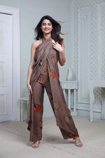Load image into Gallery viewer, BROWN PRINTED HALTER NECK FLARED JUMPSUIT
