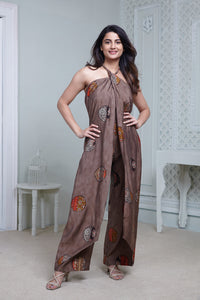 BROWN PRINTED HALTER NECK FLARED JUMPSUIT