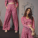Load and play video in Gallery viewer, PINK LUREX GEO PRINT SHORT JACKET PAIRED TUBE BUSTIER AND FLARE PANTS
