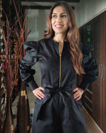 Load image into Gallery viewer, BLACK FRONT GOLDEN ZIP OPENING HIGH BAND COLLAR JUMPSUIT WITH PUFF SLEEVE &amp; BELT
