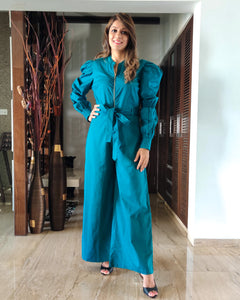 TEAL BLUE FRONT GOLDEN ZIP OPENING HIGH BAND COLLAR JUMPSUIT WITH PUFF SLEEVE & BELT