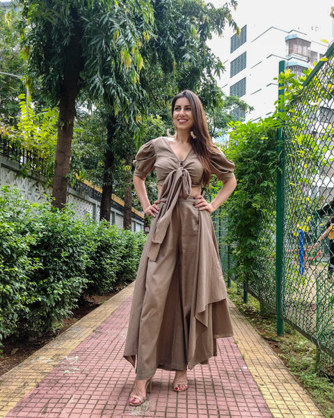 KHAKHEE GREEN PUFFED SLEEVES TOP WITH TIE UP DETAIL PAIRED WITH FLARED PANTS
