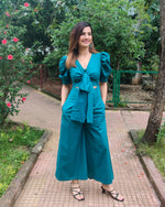 Load image into Gallery viewer, TEAL FRONT TIE UP AND PUFFED SHORT SLEEVED JUMPSUIT
