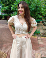 Load image into Gallery viewer, BEIGE PUFF SLEEVES FRONT TIEUP TOP PAIRED WITH FLARE PANTS
