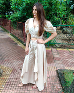 Load image into Gallery viewer, BEIGE PUFF SLEEVES FRONT TIEUP TOP PAIRED WITH FLARE PANTS
