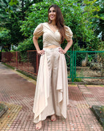 Load image into Gallery viewer, BEIGE PUFF SLEEVES FRONT TIEUP TOP PAIRED WITH FLARE PANTS
