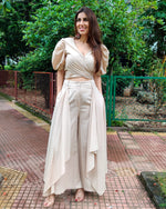 Load image into Gallery viewer, BEIGE PUFF SLEEVES FRONT TIEUP TOP PAIRED WITH FLARE PANTS

