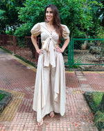 Load image into Gallery viewer, BEIGE PUFF SLEEVES FRONT TIEUP TOP PAIRED WITH FLARE PANTS
