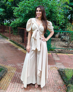 Load image into Gallery viewer, BEIGE PUFF SLEEVES FRONT TIEUP TOP PAIRED WITH FLARE PANTS
