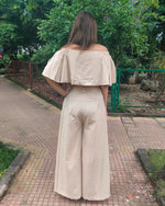 Load image into Gallery viewer, BEIGE OFF SHOULDER FLARED TOP PAIRED WITH FLARE PANTS
