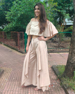 Load image into Gallery viewer, BEIGE OFF SHOULDER FLARED TOP PAIRED WITH FLARE PANTS
