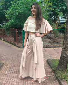 BEIGE OFF SHOULDER FLARED TOP PAIRED WITH FLARE PANTS