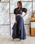 Load image into Gallery viewer, CHARCOAL BLACK PUFFED SLEEVES TOP WITH TIE UP DETAIL PAIRED WITH FLARED PANTS
